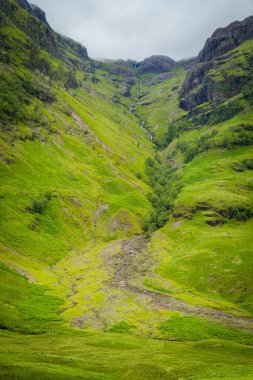Glencoe, Scottish Highlands bir bulutlu yaz öğleden sonra manzaralı manzara.
