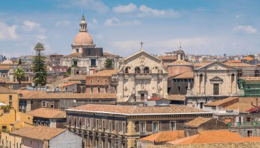 Panoramic sight in Catania from the dome of the Badia di Sant'Agata, with the Church of San Benedetto facade and the dome of San Nicol l'Arena. Sicily, Italy. clipart