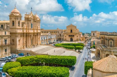 Panoramic view in Noto, with the Cathedral, Palazzo Ducezio and the Santissimo Salvatore Church. Province of Siracusa, Sicily, Italy. clipart