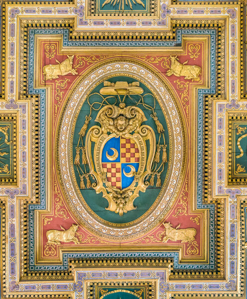 Cardinal coat of arms from the ceiling of the Church of San Marcello al Corso. Rome, Italy, December-01-2018