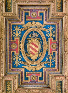 Pope Pius V coat of arms in the ceiling of the Basilica of Santa Maria in Ara Coeli, in Rome, Italy. April-18-2018 clipart