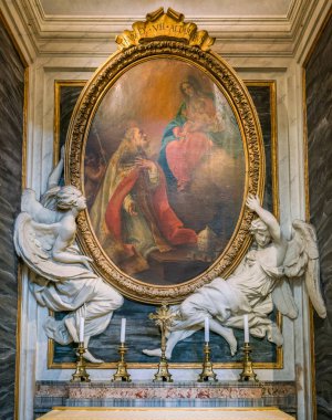 Painting supported by angel statues in the Basilica of Santa Maria Maggiore in Rome, Italy. April-07-2018