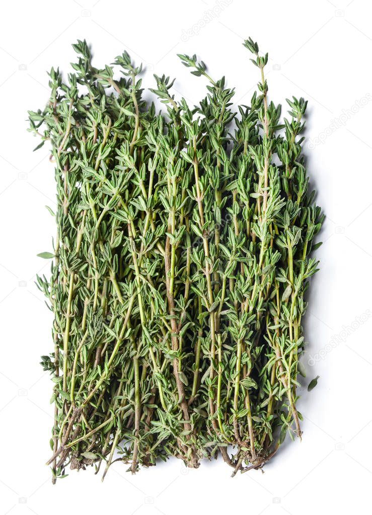 A bunch of fresh fragrant thyme. White isolated background. View from above.