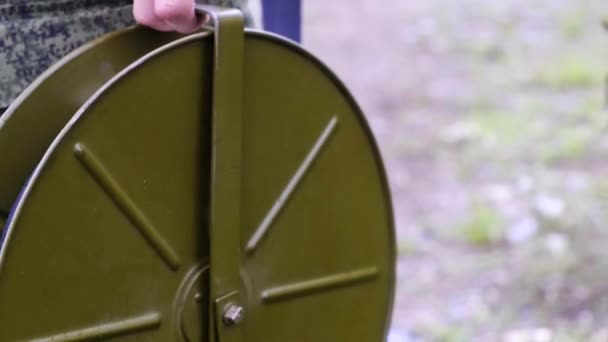 Cadet military soldier holds tape in the rain — Stock Video