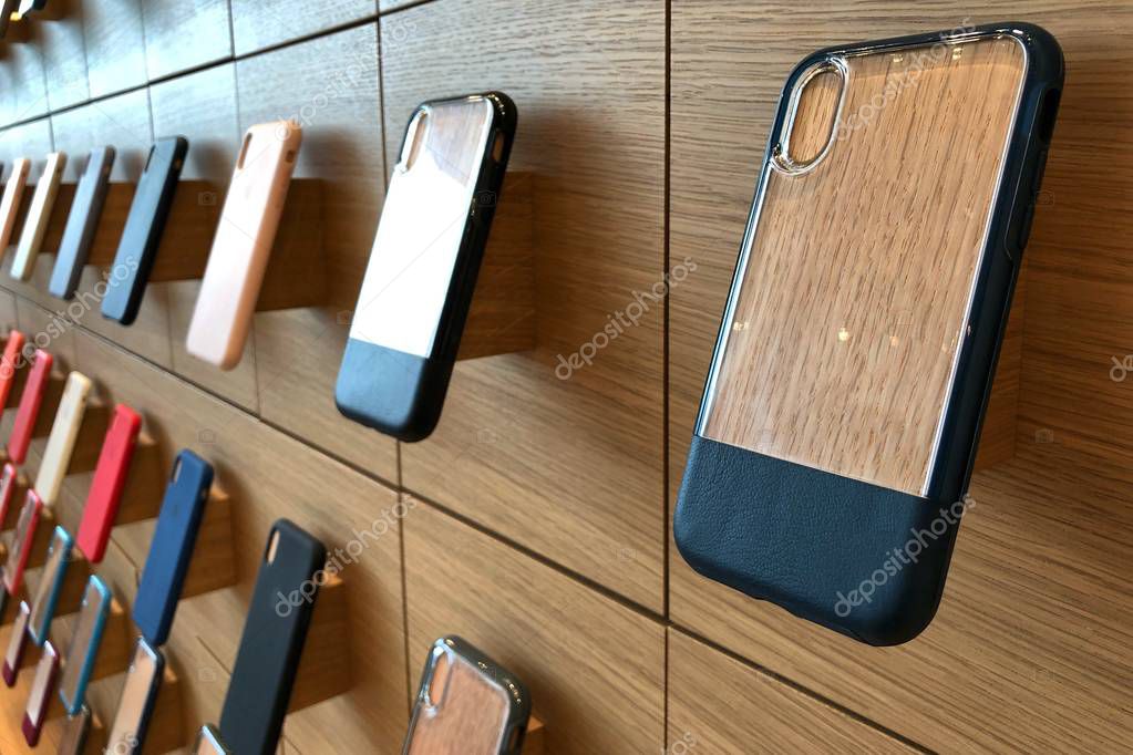 BANGKOK THAILAND -  24 NOV 2018: Apple iphone X series cases hanging on the wall in Apple store in Bangkok Thailand, This is the first Apple store was opened in Icon Siam shopping mall