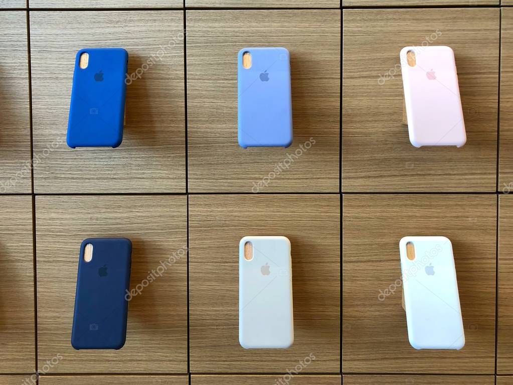 BANGKOK THAILAND -  24 NOV 2018: Apple iphone X series cases hanging on the wall in Apple store in Bangkok Thailand, This is the first Apple store was opened in Icon Siam shopping mall