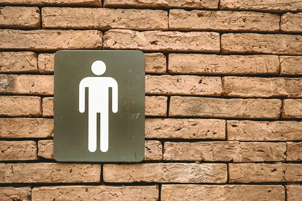 Manliga Toalett Symboler Röda Tegelväggar — Stockfoto