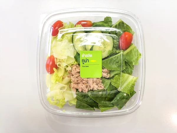 Fresh tuna salad in container with Thai language on pack ready to eat