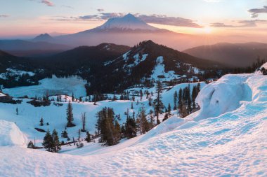 At 10,492 feet high, Mt Jefferson is Oregon's second tallest mountain.Mount Jefferson Wilderness Area, Oregon The snow covered central Oregon Cascade volcano Mount Jefferson rises above a pine forest clipart