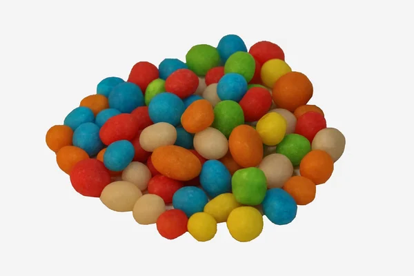 Beyaz arka plan üzerinde renkli karamelli şeker avuç