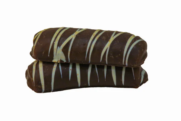 beyaz zemin üzerine beyaz çizgili çikolata şekerleme