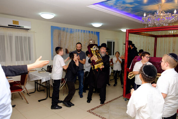 ISRAEL - Netanya, 23 October 2017: Young religious Jews in the synagogue during the bar mitzvah celebration