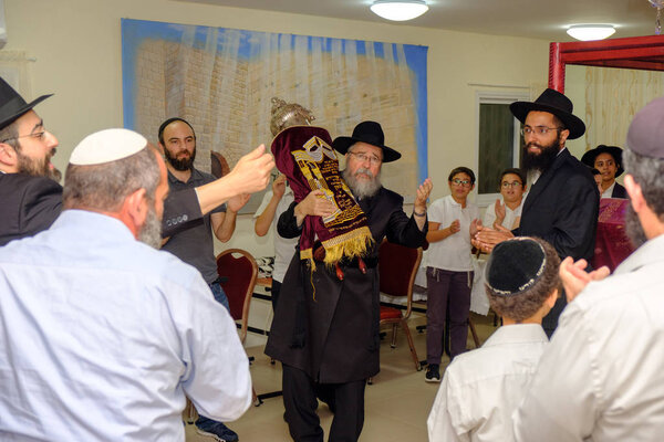 ISRAEL - Netanya, 23 October 2017: Young religious Jews in the synagogue during the bar mitzvah celebration