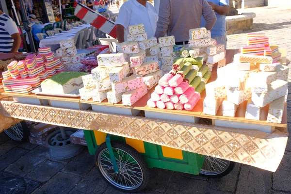 street market tray sweets oriental tourists travel sea israel acre