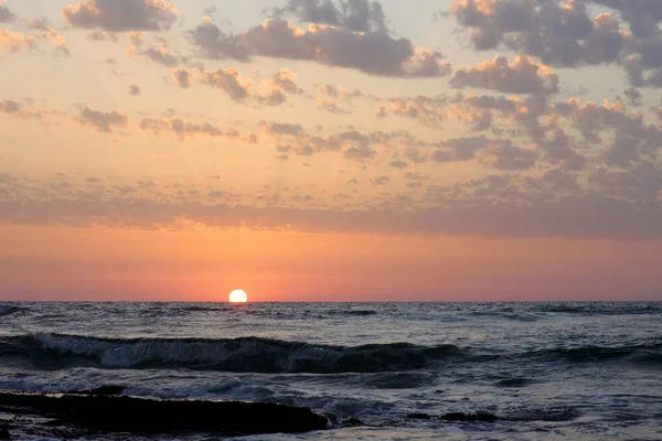 sunset and sky and sea and clouds in the Mediterranean Sea in Israel