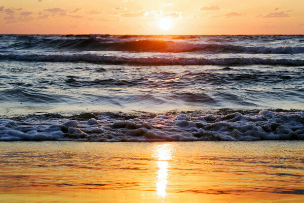 sunset and sun and sea and water and clouds