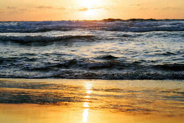 sunset and sun and sea and water and clouds