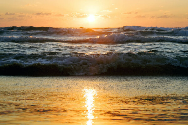 sunset and sun and sea and water and clouds