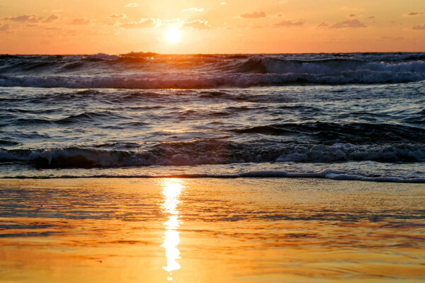 sunset and sun and sea and water and clouds