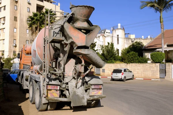 concrete mixer on the street in cement costs