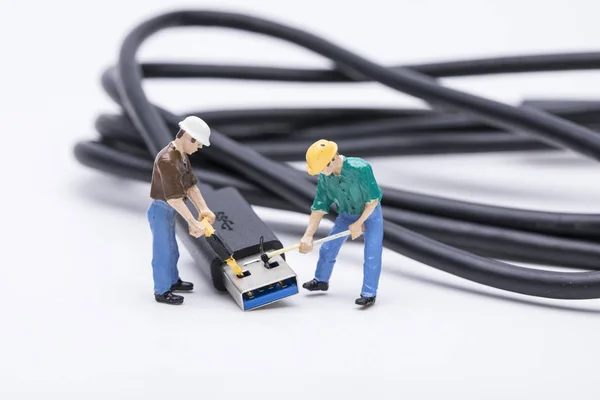 maintenance man repairing electronic equipment