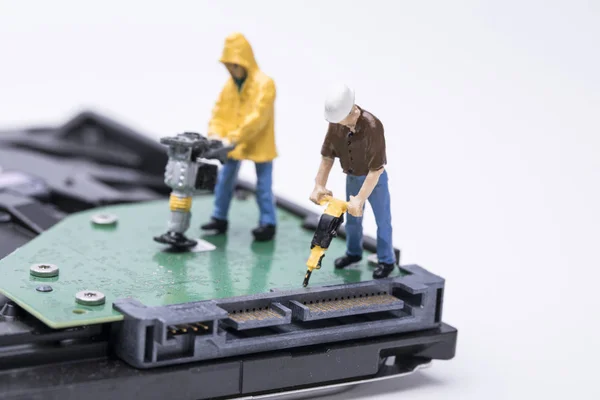 maintenance man repairing electronic equipment