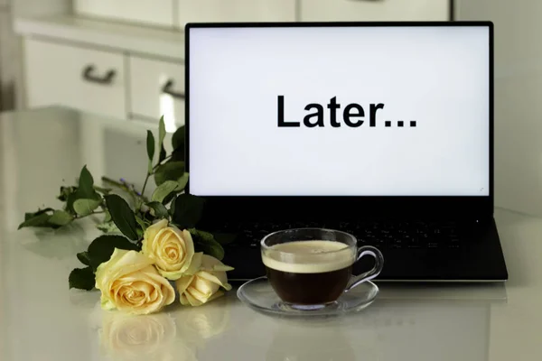 Procrastination, delay and urgency concept. Bad time management. Word later on a white monitor screen — Stock Photo, Image