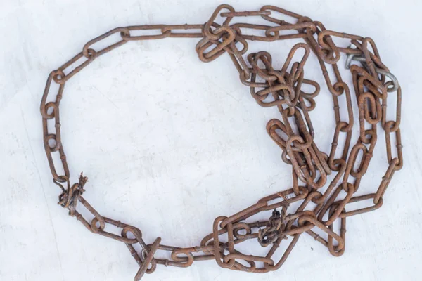 Old rusty bolts and nuts. Old rusty chain. Top view with copy space. — Stock Photo, Image