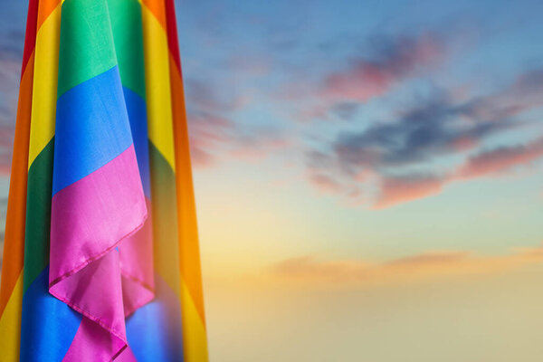 Pride community flags at sunset. Perfect banner, background for pride month. 