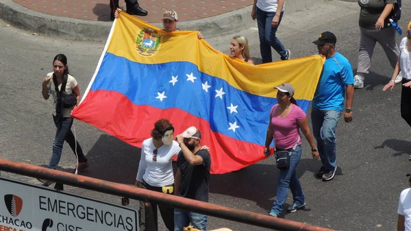 Venezuela 'da özgürlüğün protesto edilmesi. Komünizmle karşı, sosyalizme karşı. Öğrenciler ve insanlar Caracas Venezuela özgürlüğü protesto, yaklaşık Mart 2014