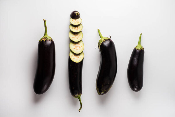 Top view of eggplants on white background