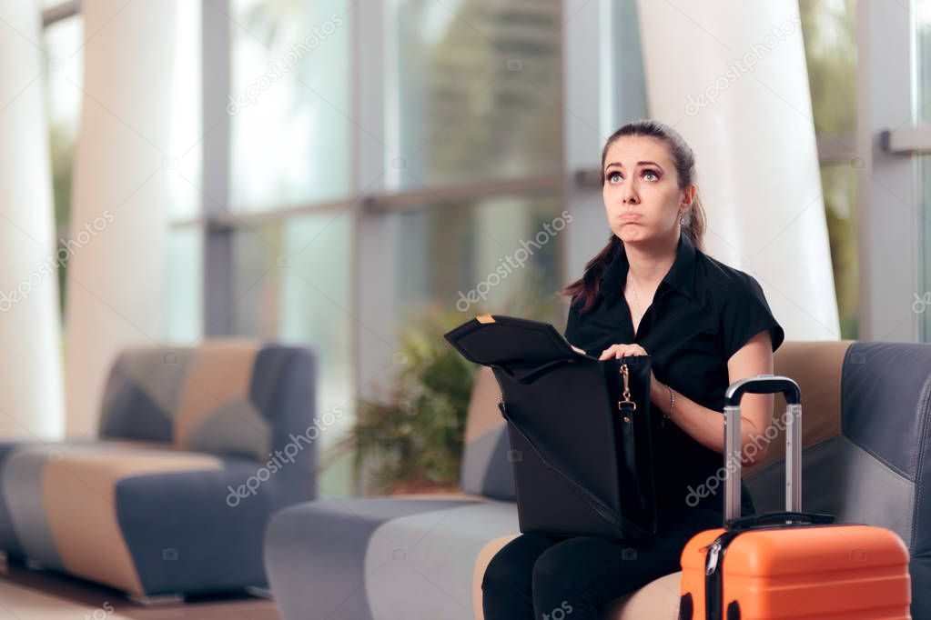 Forgetful Girl Checking her Bag in an Airport