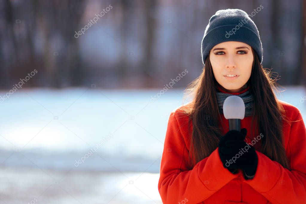 Winter TV Reporter Broadcasting Outdoors in the Snow