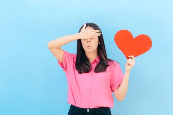 Woman Covering Her Eyes Holding Big Heart — Stock Photo, Image