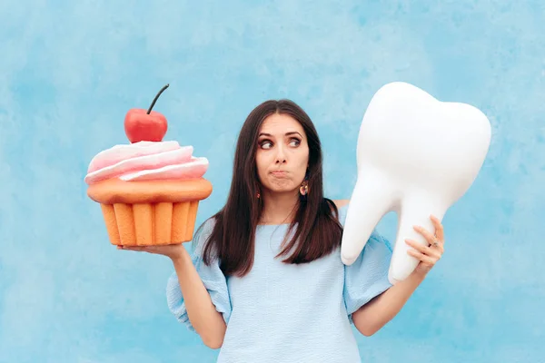 Funny Woman Holding Big Cupcake Tooth — Stok Foto