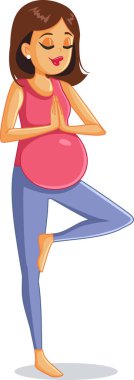 hamile kadın doğum öncesi yoga yaparken