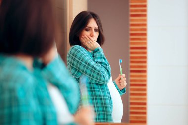 Pregnant Woman with Morning Sickness Looking in the Mirror  clipart