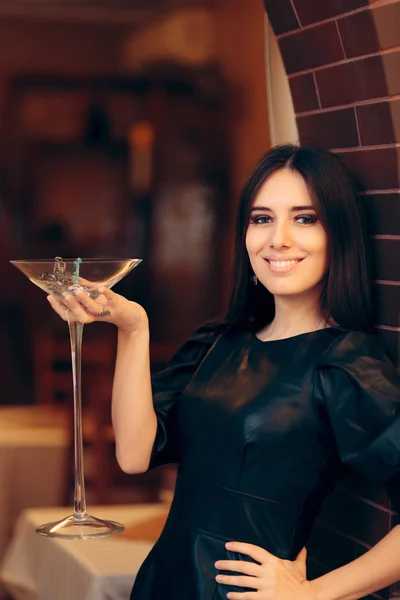 Woman Holding Giant Champagne Glass Filled Jewelry — Stok Foto