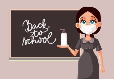 Okulun Yeniden Açılışında Yüzü Maskeli ve El Dezenfektanlı Kadın Öğretmen