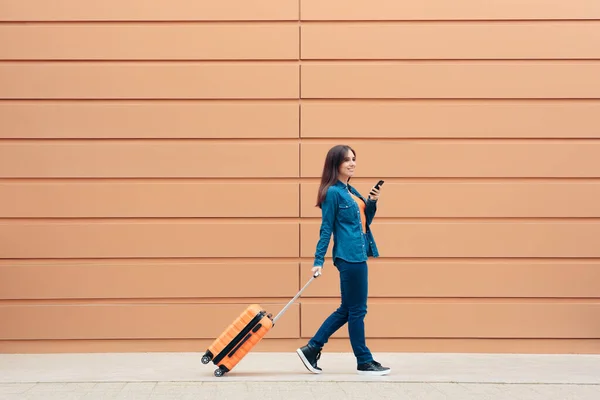 Travel Woman with Luggage Suitcase Checking Smartphone