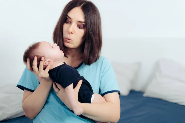 Stressed Mom Holding Crying Baby Feeling Clueless