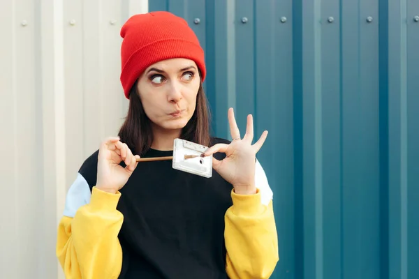 Millennial Hipster Girl Holding Audio Tape Cassette Pencil — Stok Foto