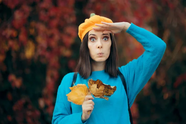 Funny Woman Wearing Pumpkin Hat Holding Autumn Leaves — Stock Photo, Image