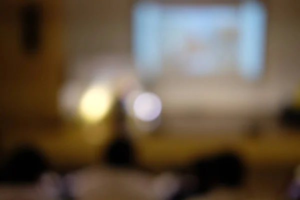 stage & presentation screen in seminar conference room. blur background