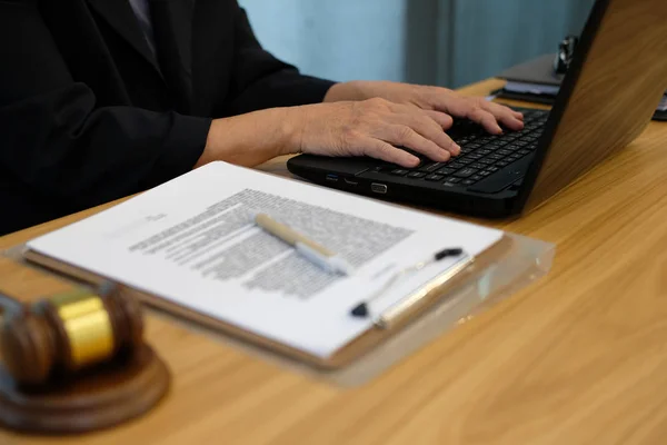 judge working with computer. legal law gavel at courtroom. lawyer attorney justice at court