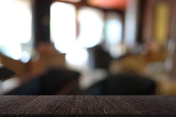 cafe coffee shop restaurant interior. defocused blur background with wood table for montage display product
