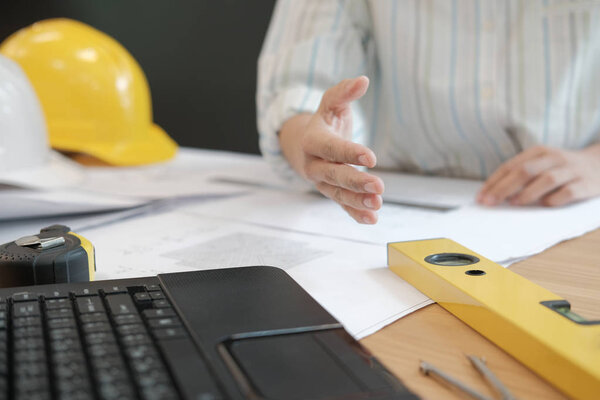 engineer offering handshake. architect ready to shake hand for building construction project