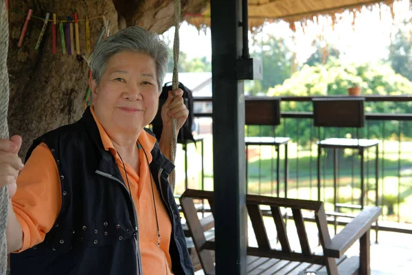 Asian Elder Woman Resting Terrace Patio Elderly Female Relaxing Swing — Stock Photo, Image