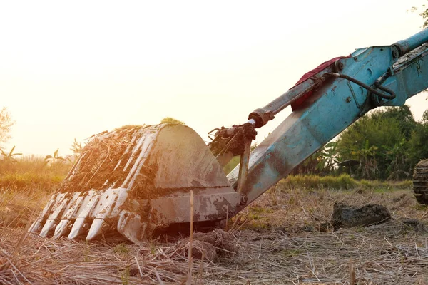 Excavator backhoe tractor at construction site — Stock Photo, Image