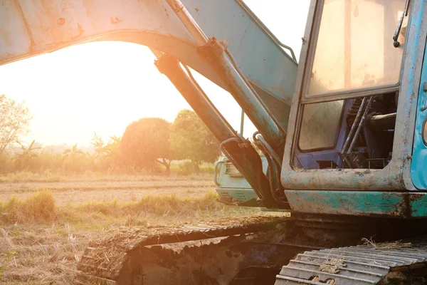 Excavator backhoe tractor at construction site — Stock Photo, Image